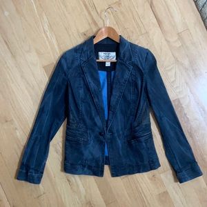 Diesel women’s single button denim blazer with black trim for a sharp look.